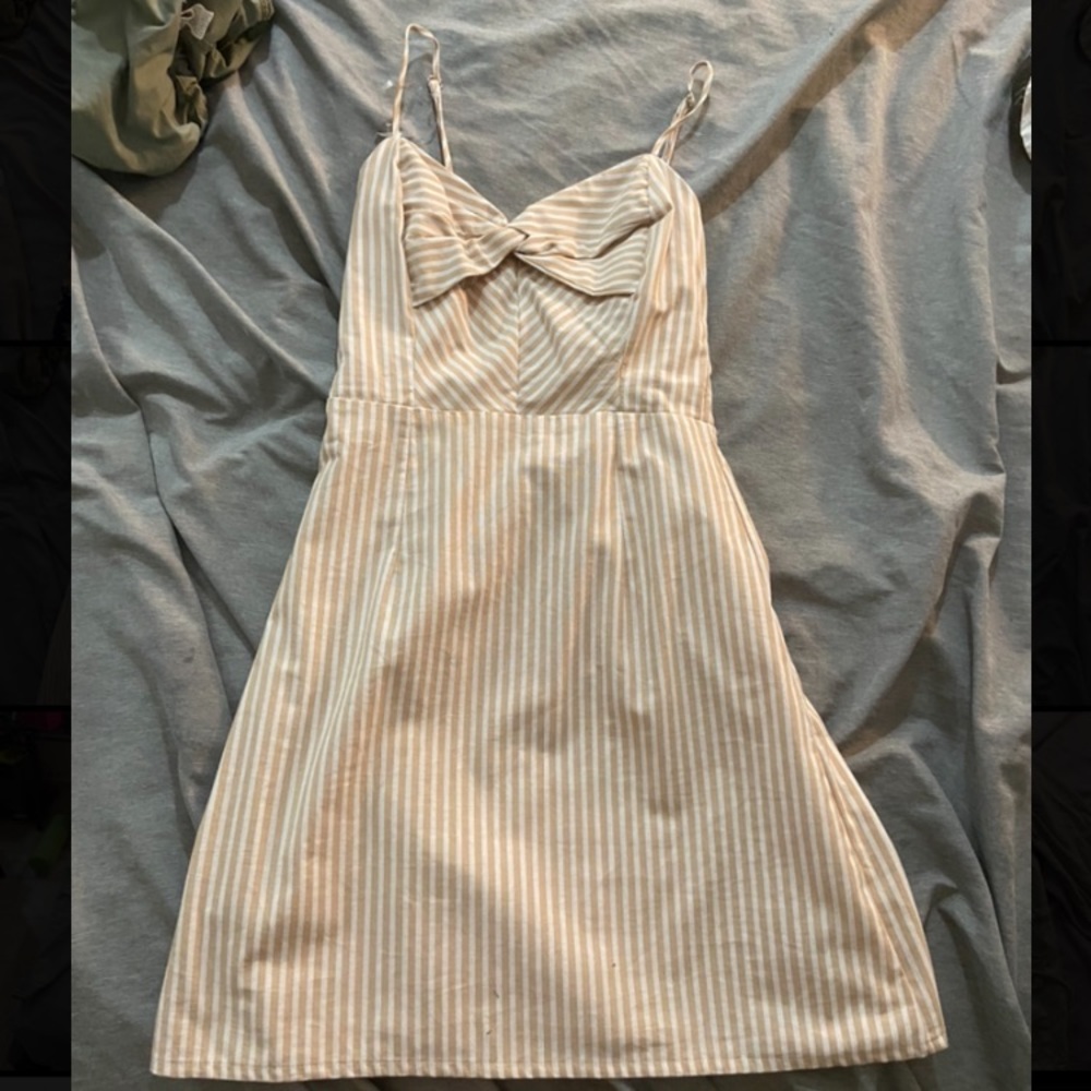 Mini dress “derek heart” with cream and white lines.